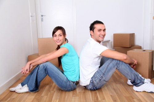 Residential furniture being organised for storage in Northkensington