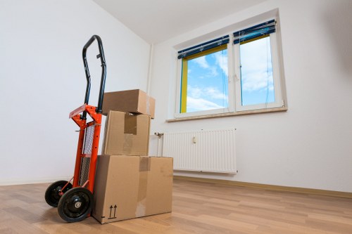Removal team packing boxes for a Northkensington home move